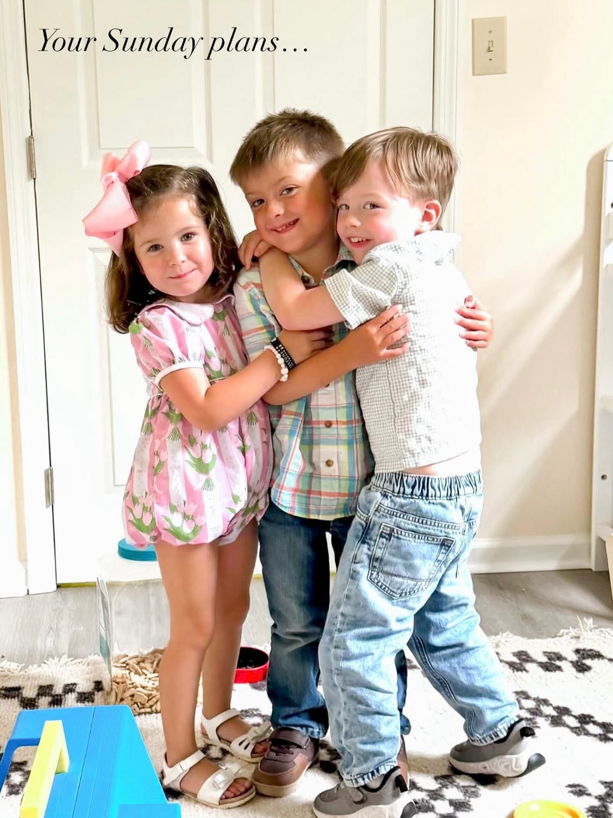 Three children smiling together before church